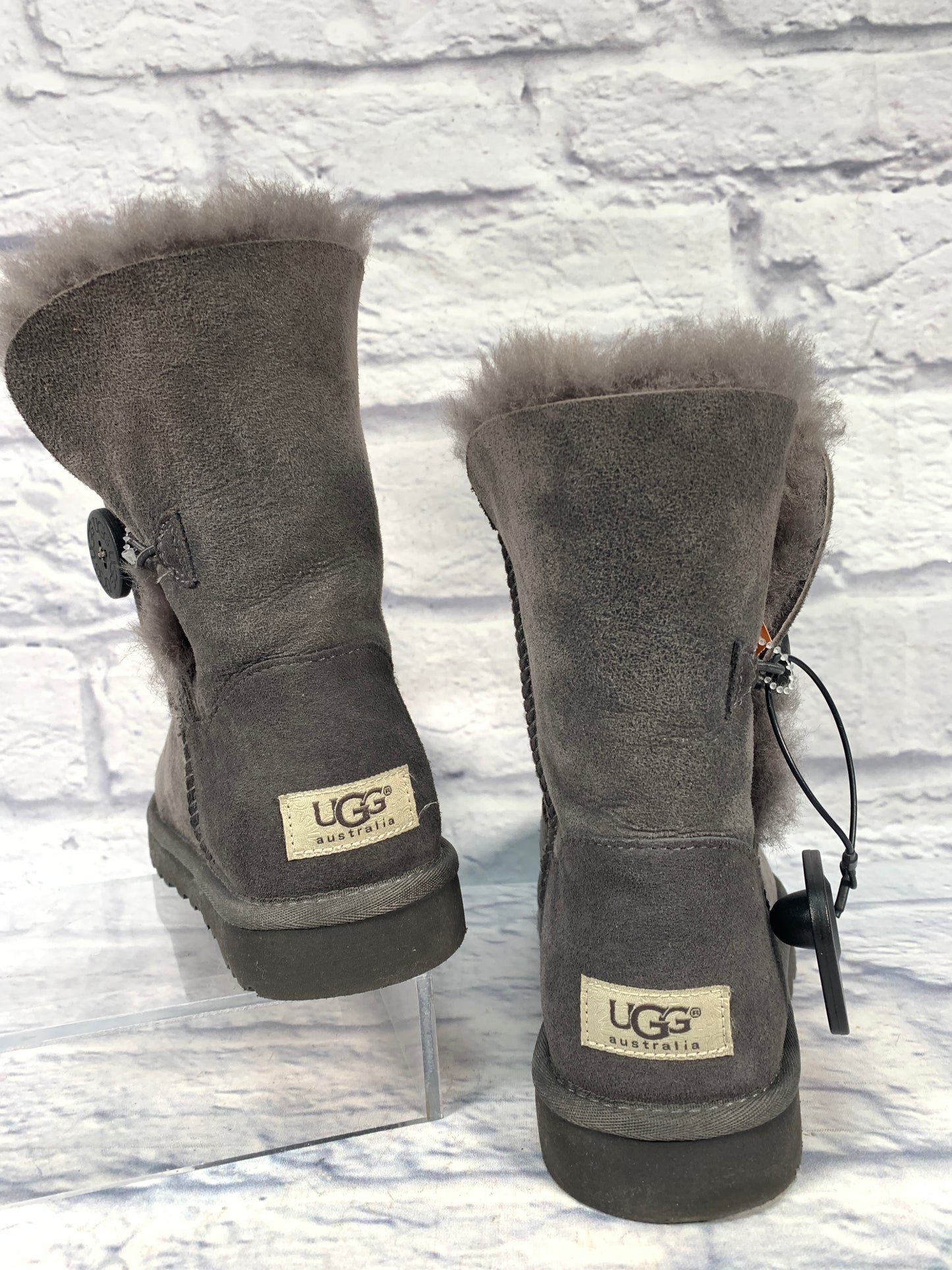 Boots Designer By Ugg In Grey, Size: 7